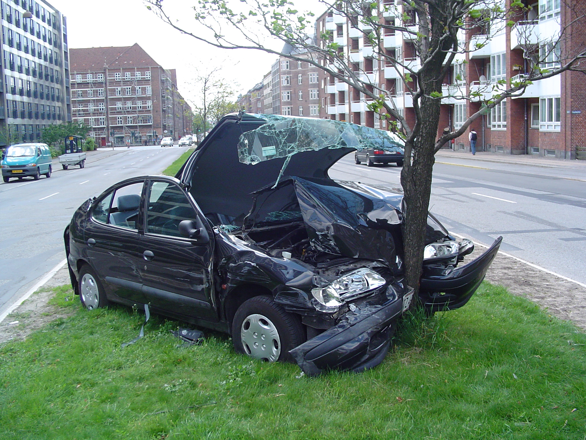 Two vehicles in a collision after being hit by an uninsured driver