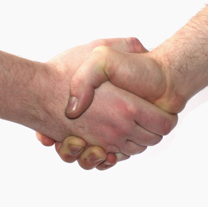 Handshake representing a car accident settlement reached after a demand letter