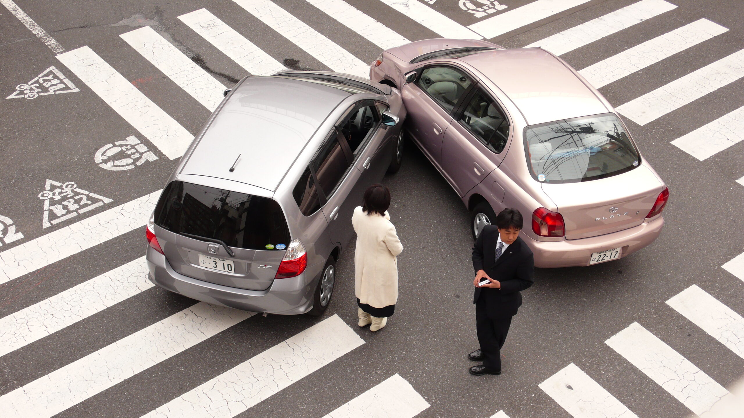 Car accident scene where delayed injuries may appear hours or days later