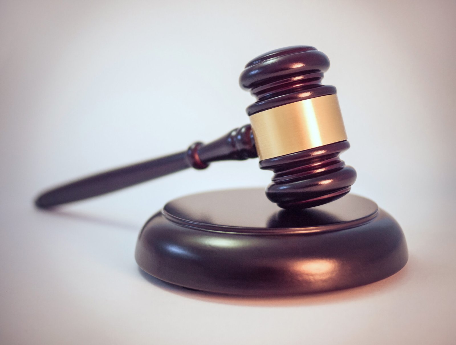 A legal gavel representing questions to ask a car accident lawyer